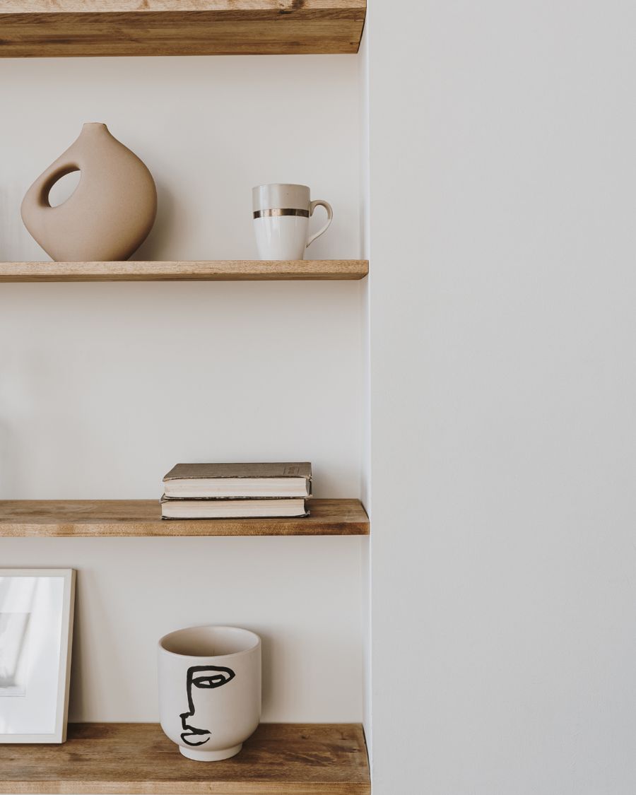 Styled shelves with books representing guides and templates